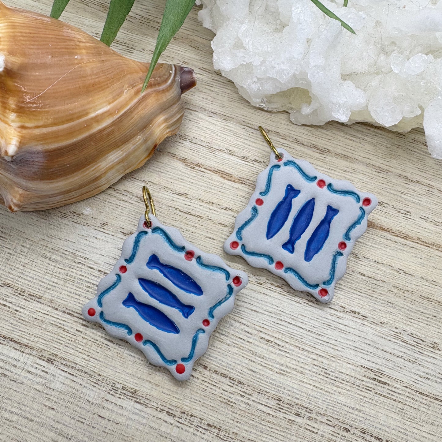 Gone Fishin’ dangles in red blue