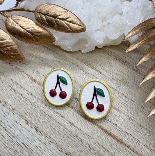 Portrait studs in Cherries